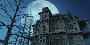 An Image Showing Haunted House With Fullmoon in the background.